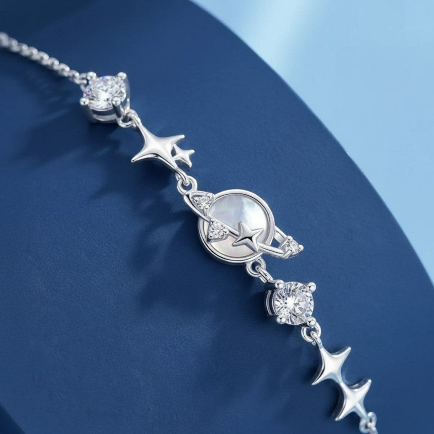 LUMIOR Zircon Star verstelbare armband van 925 sterling zilver met zirkonia accenten en planeet- en sterbedels.