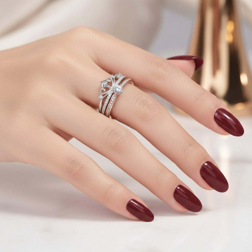 LUMIOR Aurelia™ ring met kroon silhouet, tweekleurig roségoud en zilver, bezet met moissaniet stenen.