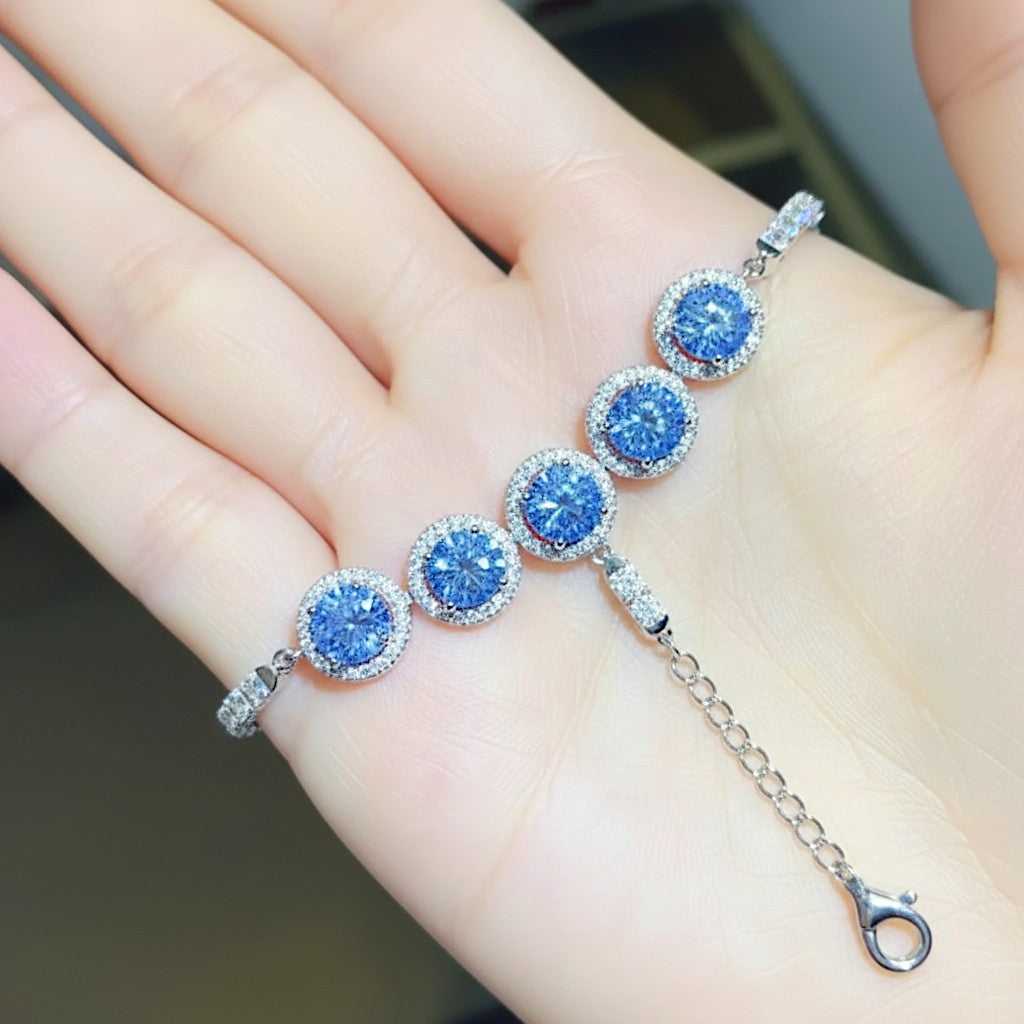 LUMIOR 5-karaats blauwe moissaniet armband met 925 sterling zilver en platina plating. Verstelbare ketting met karabijnsluiting.