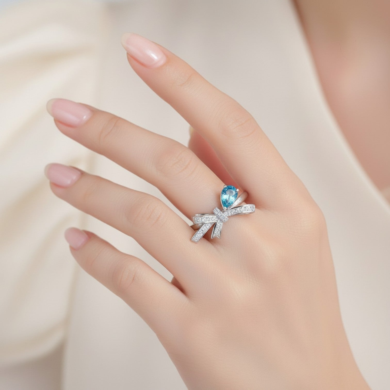 LUMIOR Céleste™ ring met strikvorm en blauwe moissanite diamant in 925 sterling zilver