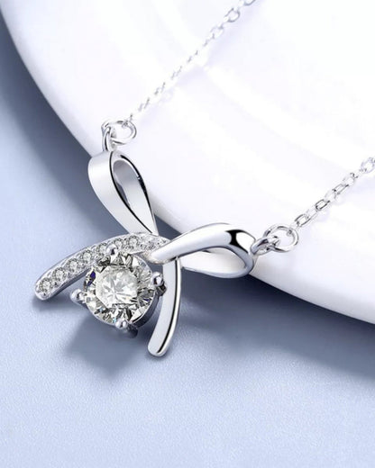 LUMIOR ketting van 925 sterling zilver met een strikvormige hanger, bezet met schitterende zirkonia stenen.